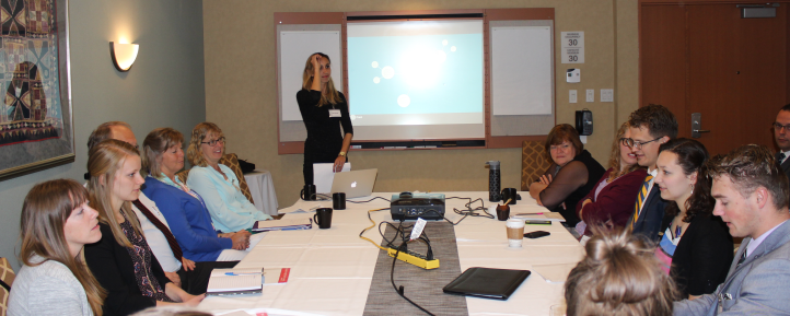 Delegates participate in a social media workshop